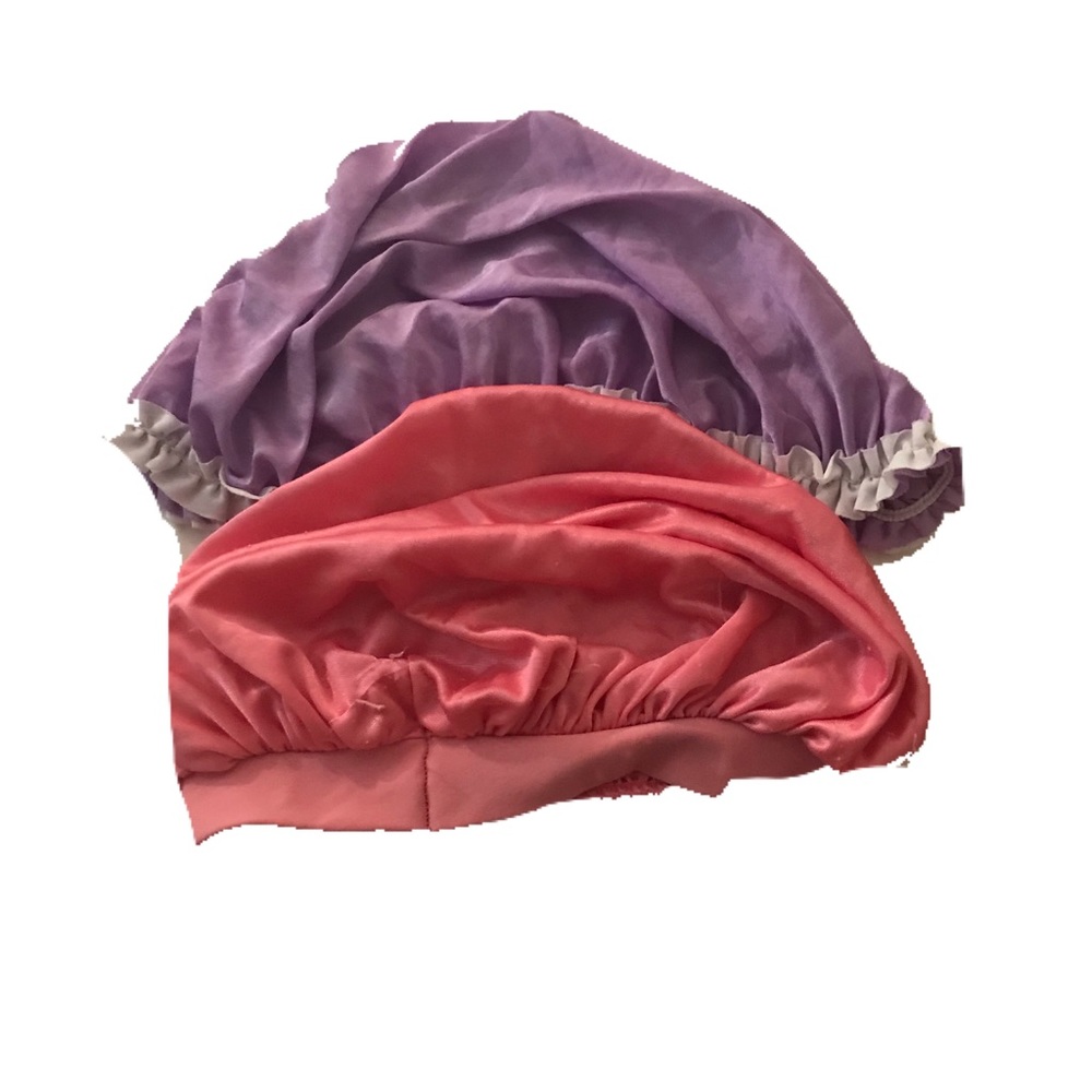 Two bonets, one pink one purple